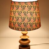 Turned wooden base lamp with printed lampshade