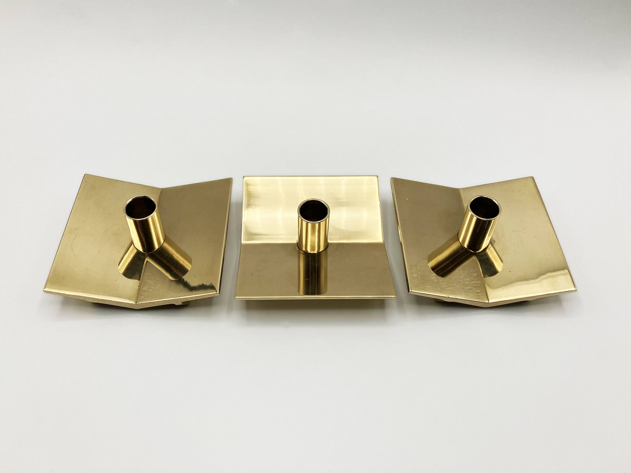 3 “Profile” candlesticks no. 70 in brass • Design Pierre Forssel for Skultuna Éditions • 1960