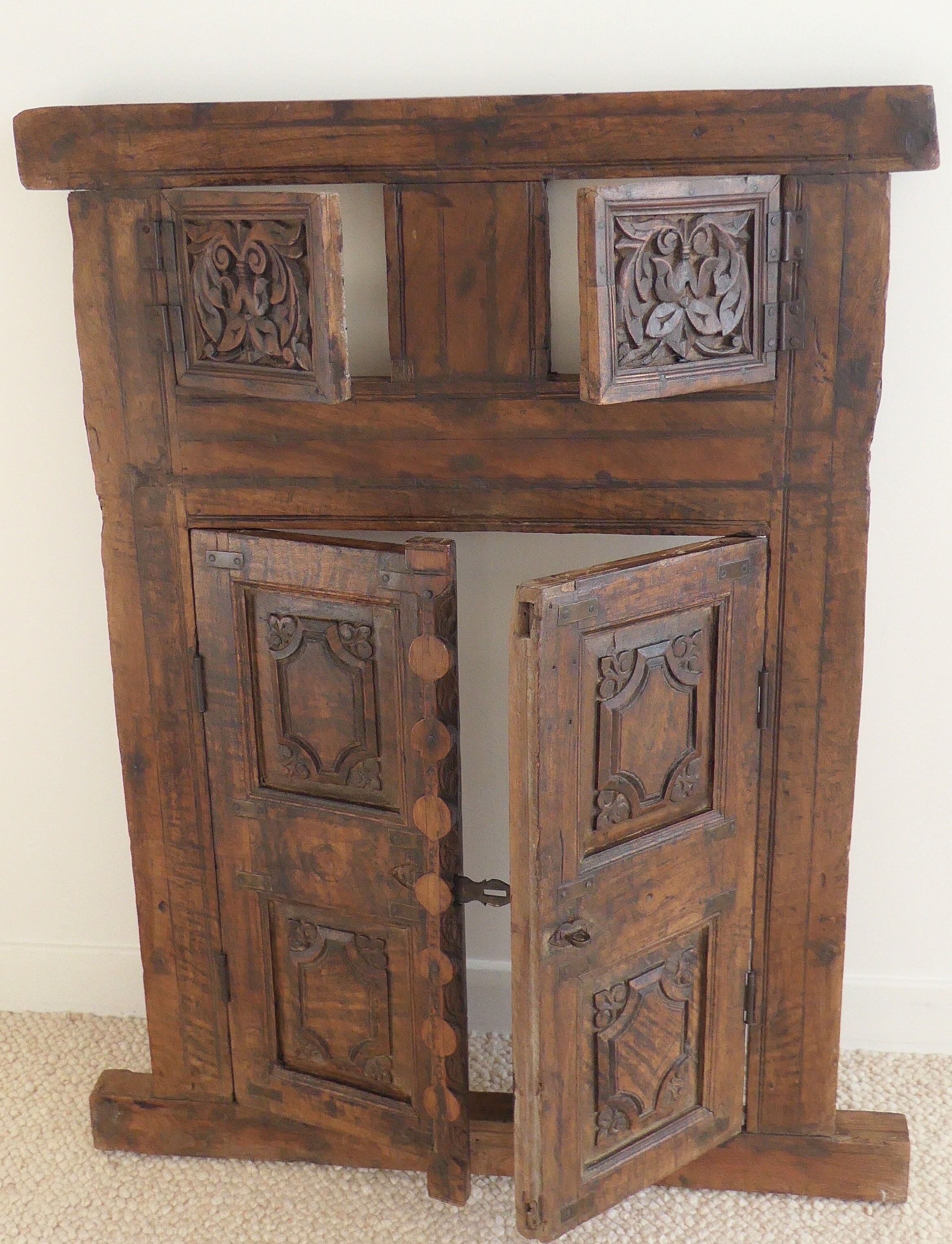 Antique carved wooden window and shutter from Rajasthan
