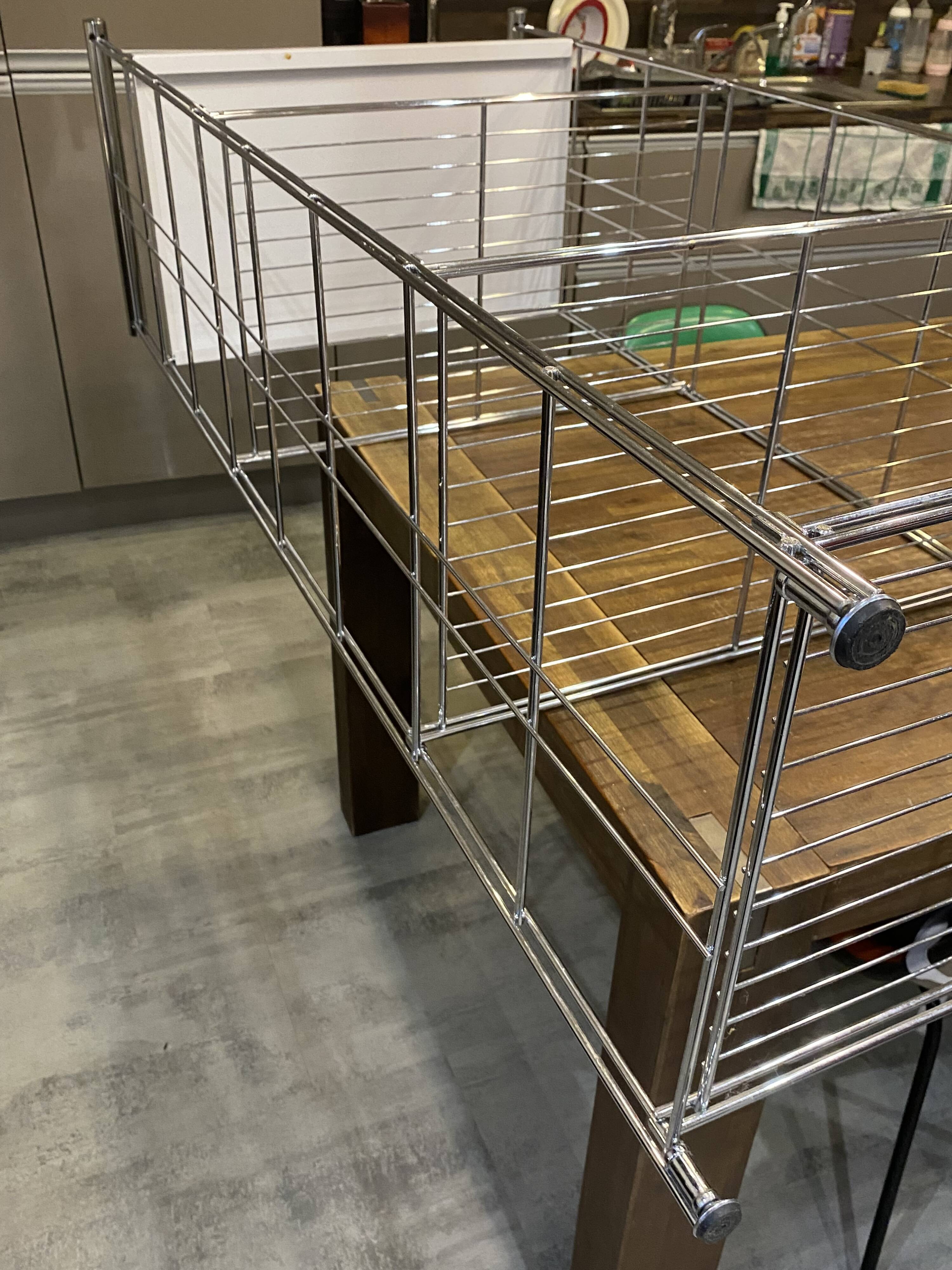 Modular wall bookshelf desk in vintage chrome.
