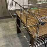 Modular wall bookshelf desk in vintage chrome.