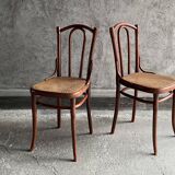 Pair of caned bistro chairs by Thonet