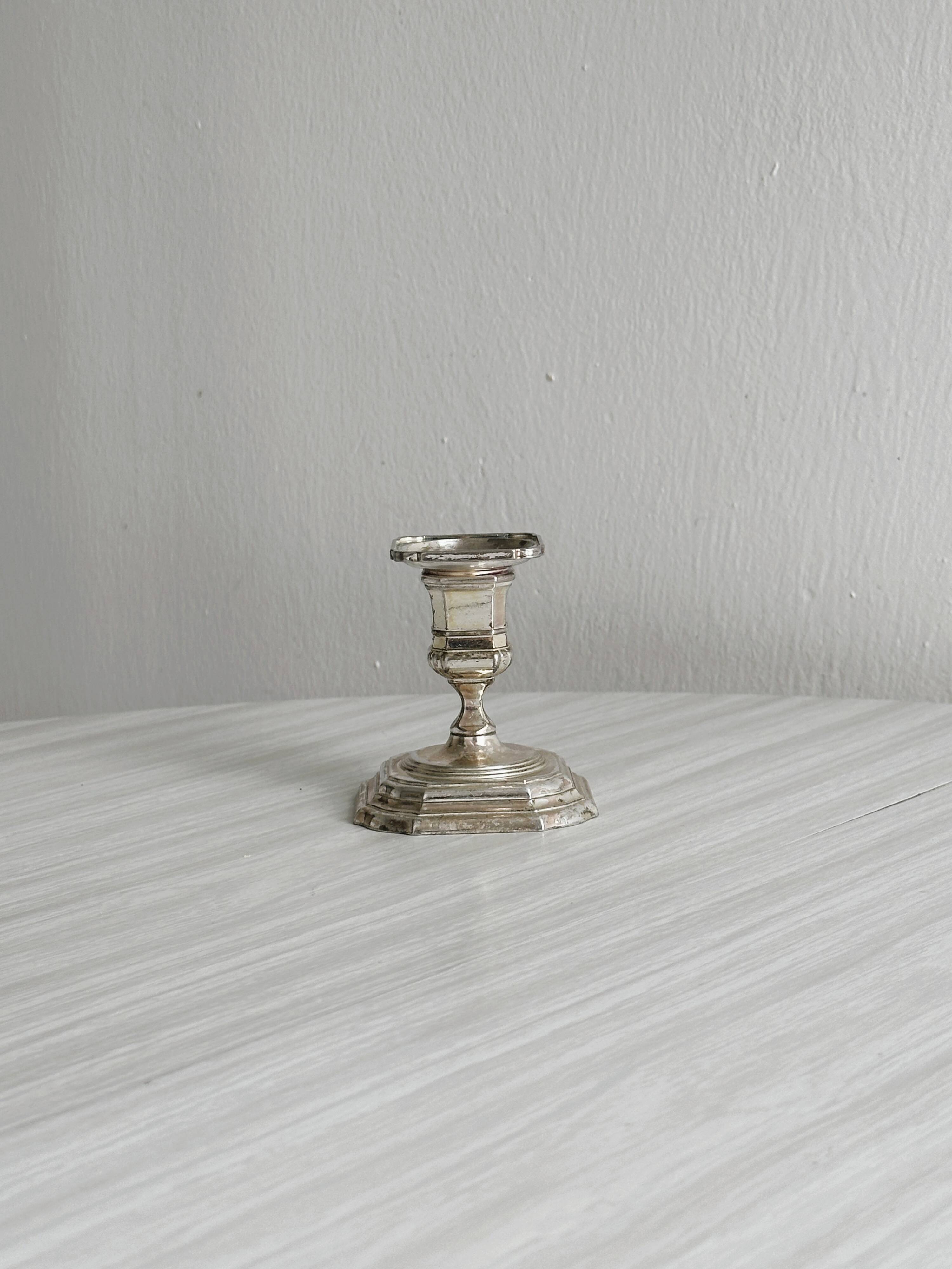 Small antique metal candle holder