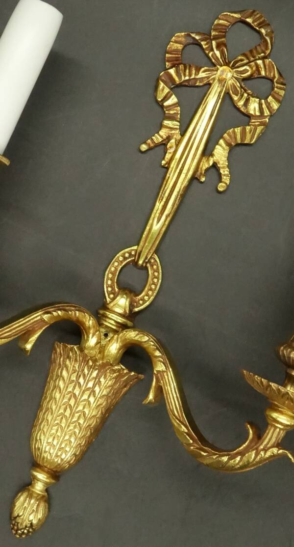 Pair of Louis XVI style knot wall lights - gilded bronze