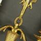 Pair of Louis XVI style knot wall lights - gilded bronze