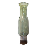 Old green milk bottle