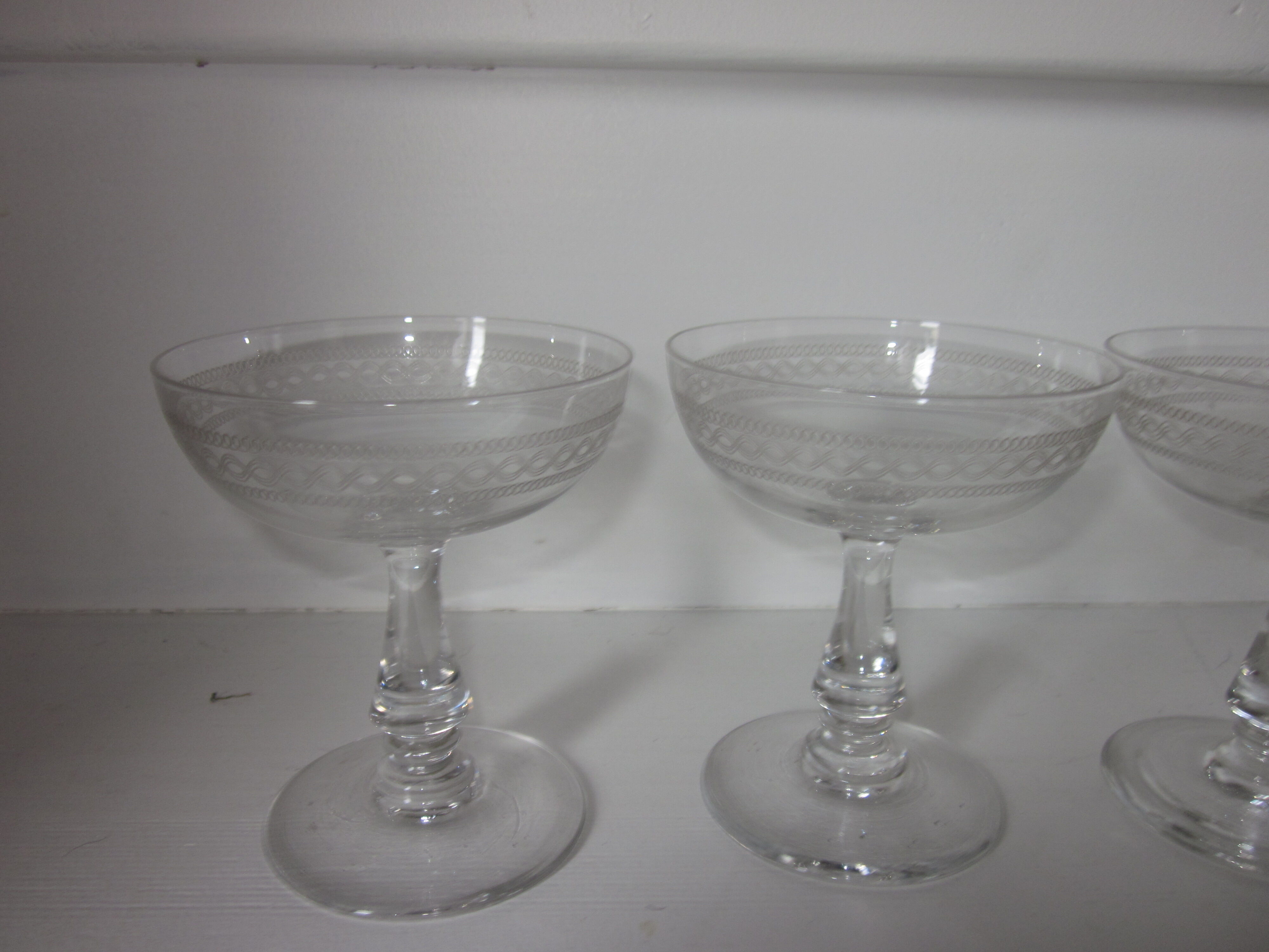 Set of 4 old champagne glasses