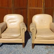 Pair of 1930s club armchairs in ivory leather.