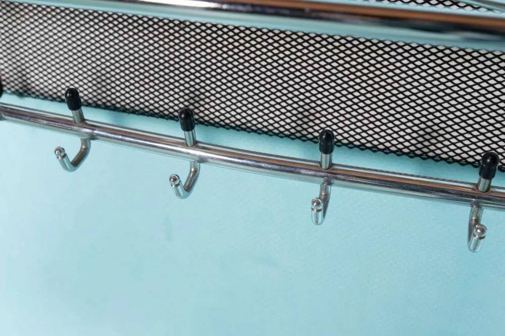 Minimalist metal coat rack from the 1970s