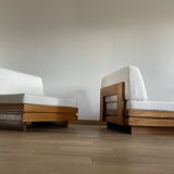 Pair of solid elm low chairs from Maison Regain, 1960