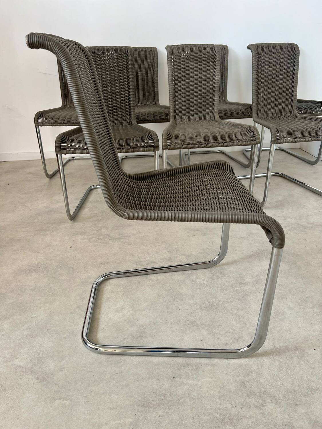 Set of 8 Tecta designer tubular chairs, Bauhaus style, metal and vintage gray cane, 80s