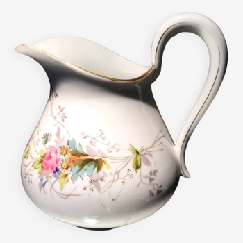 Milk jug or water jug in white porcelain with floral decoration