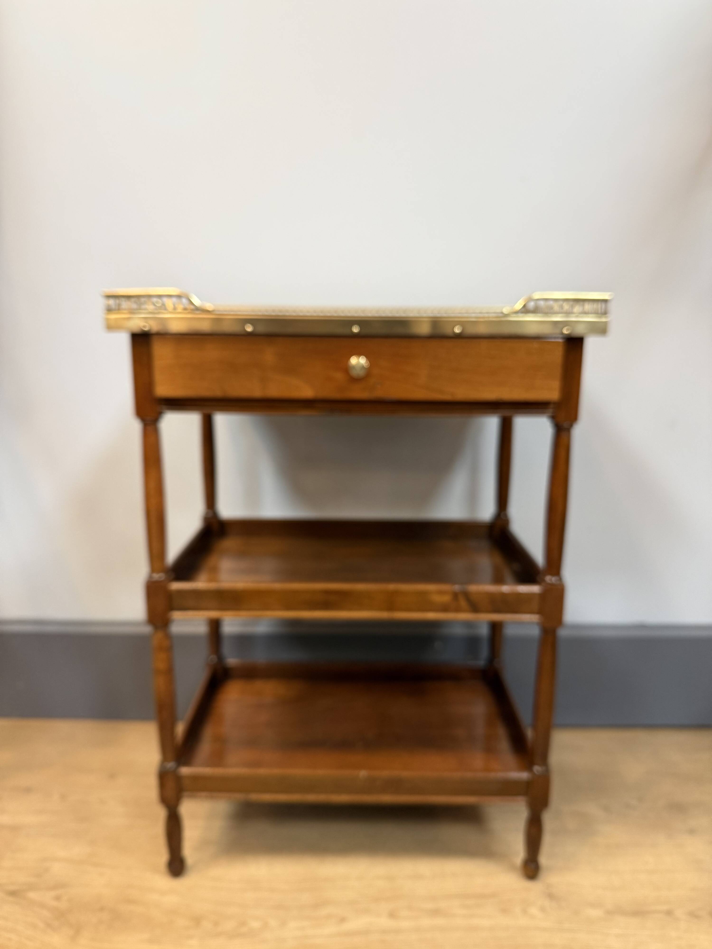 Small mahogany side table in Louis XVI style.