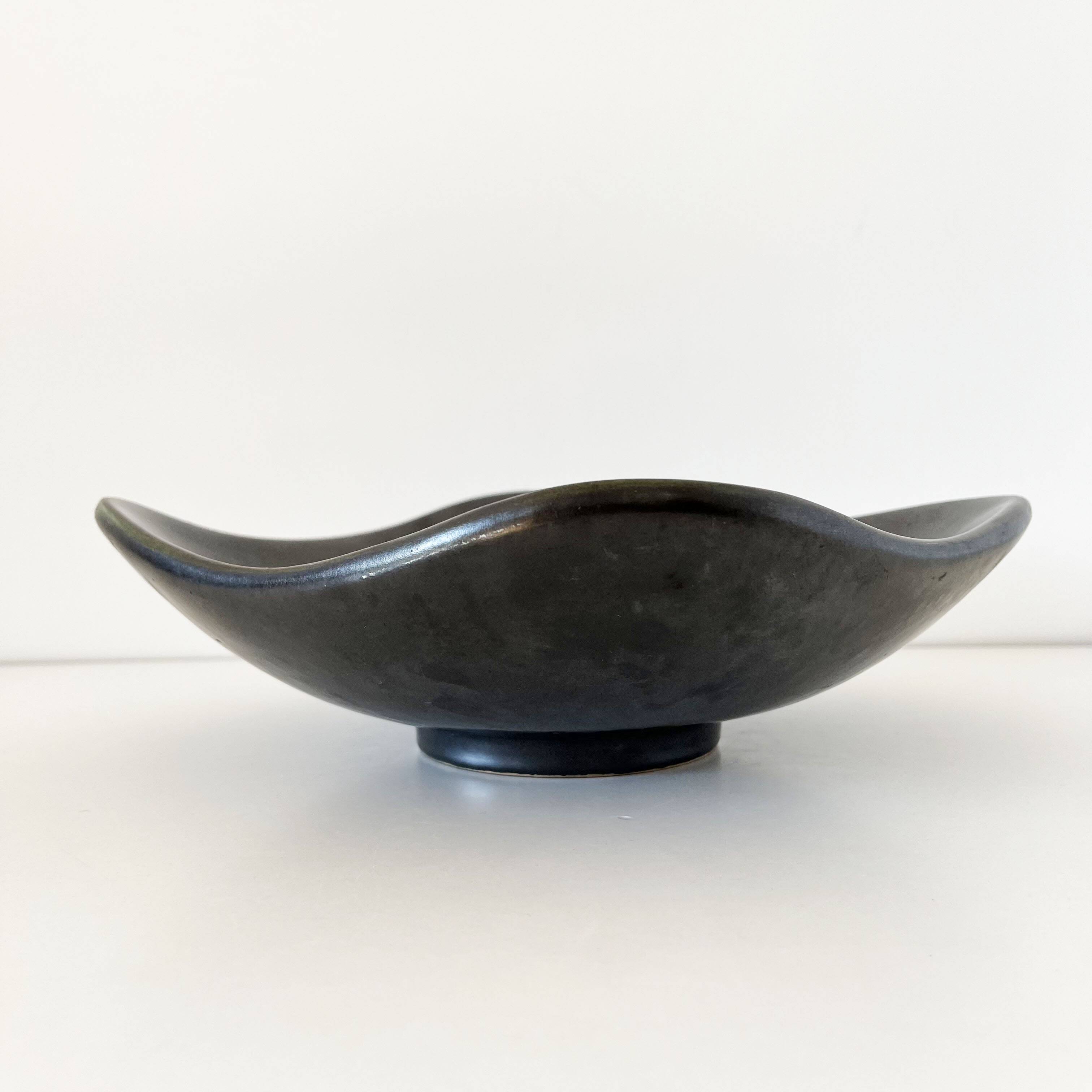 Matte and iridescent black ceramic dish 1960