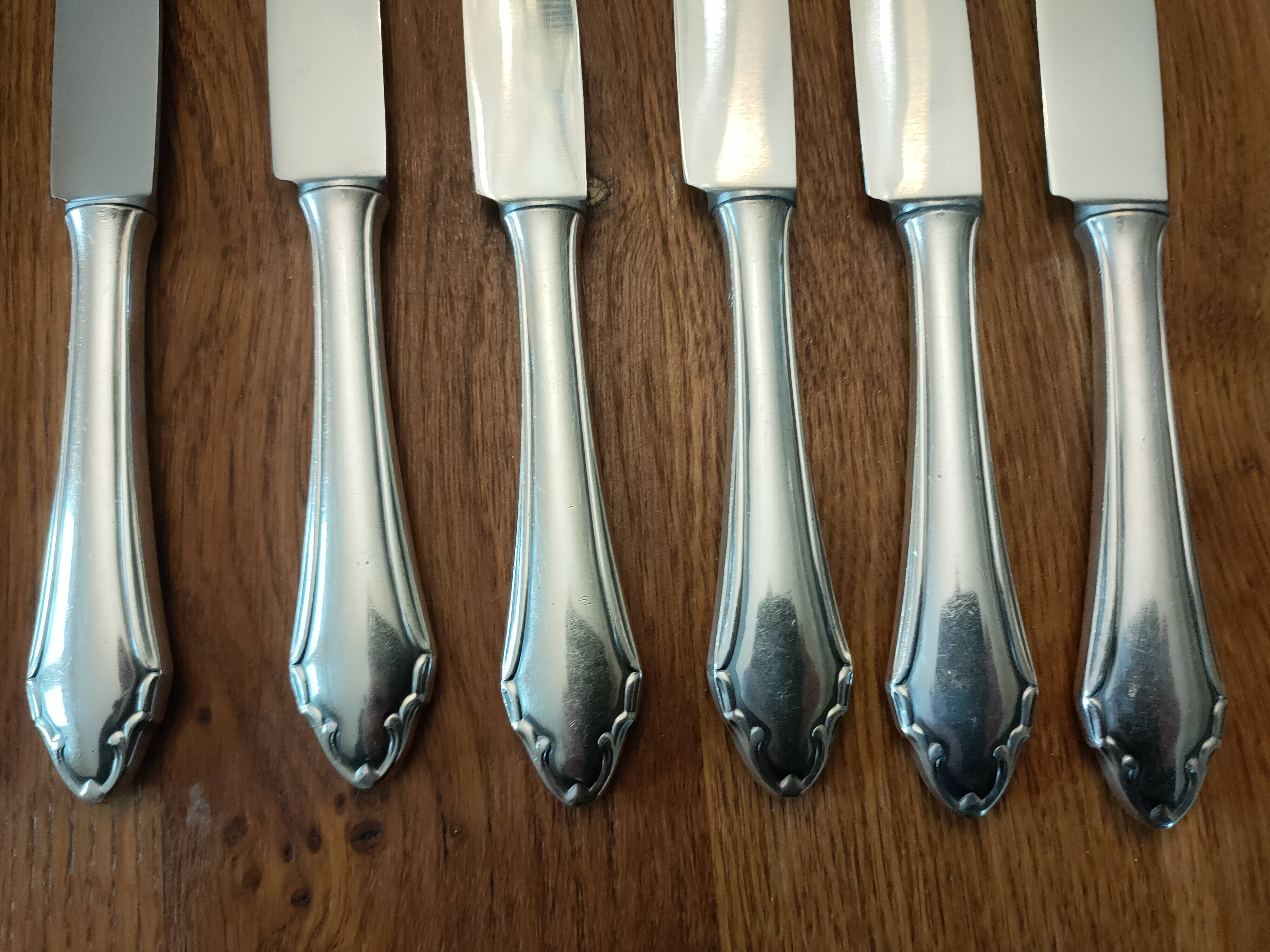 set of 11 silver metal cutlery