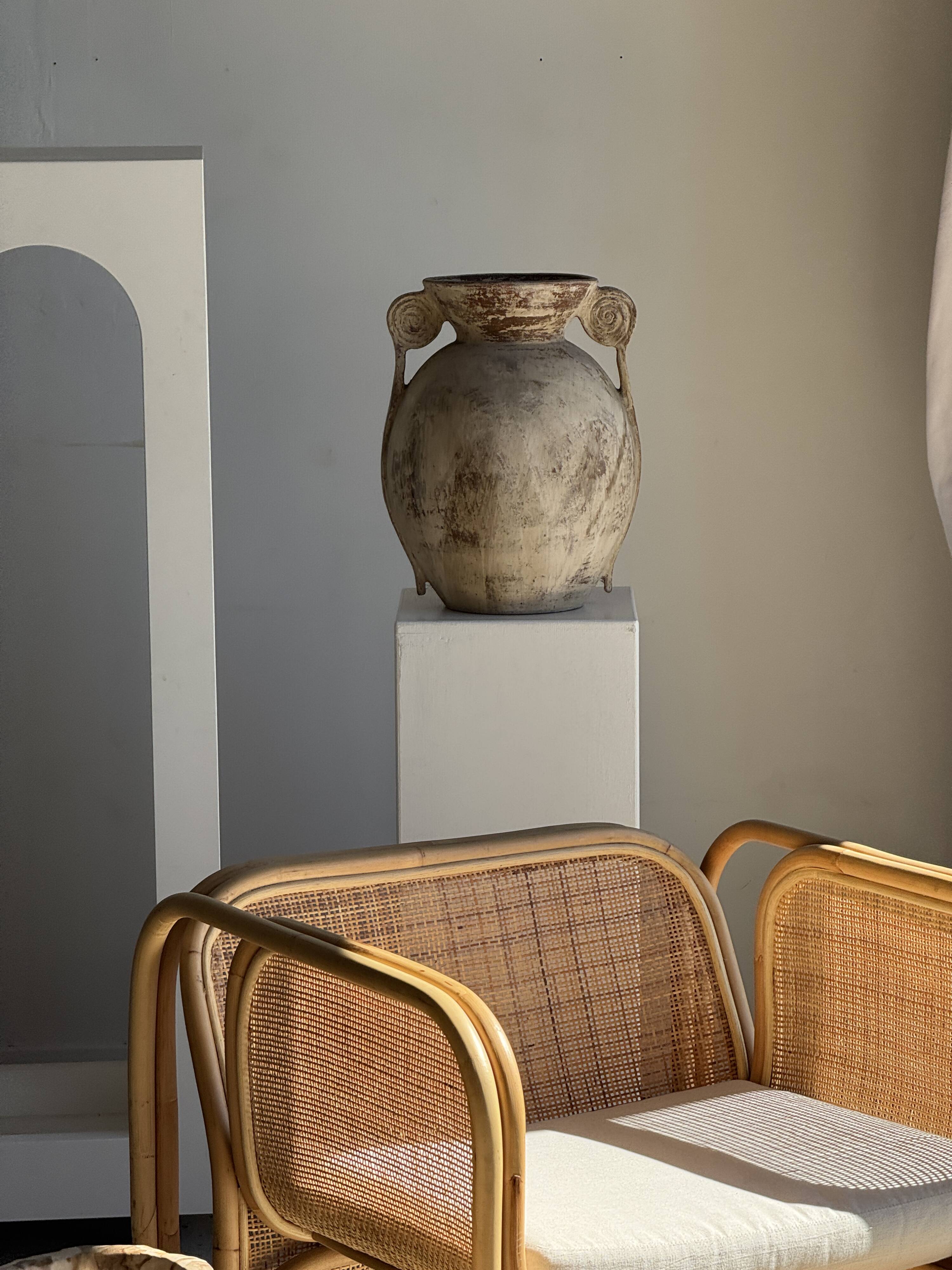 Natural solid suar side table (monoxyle) with a minimal conical base.