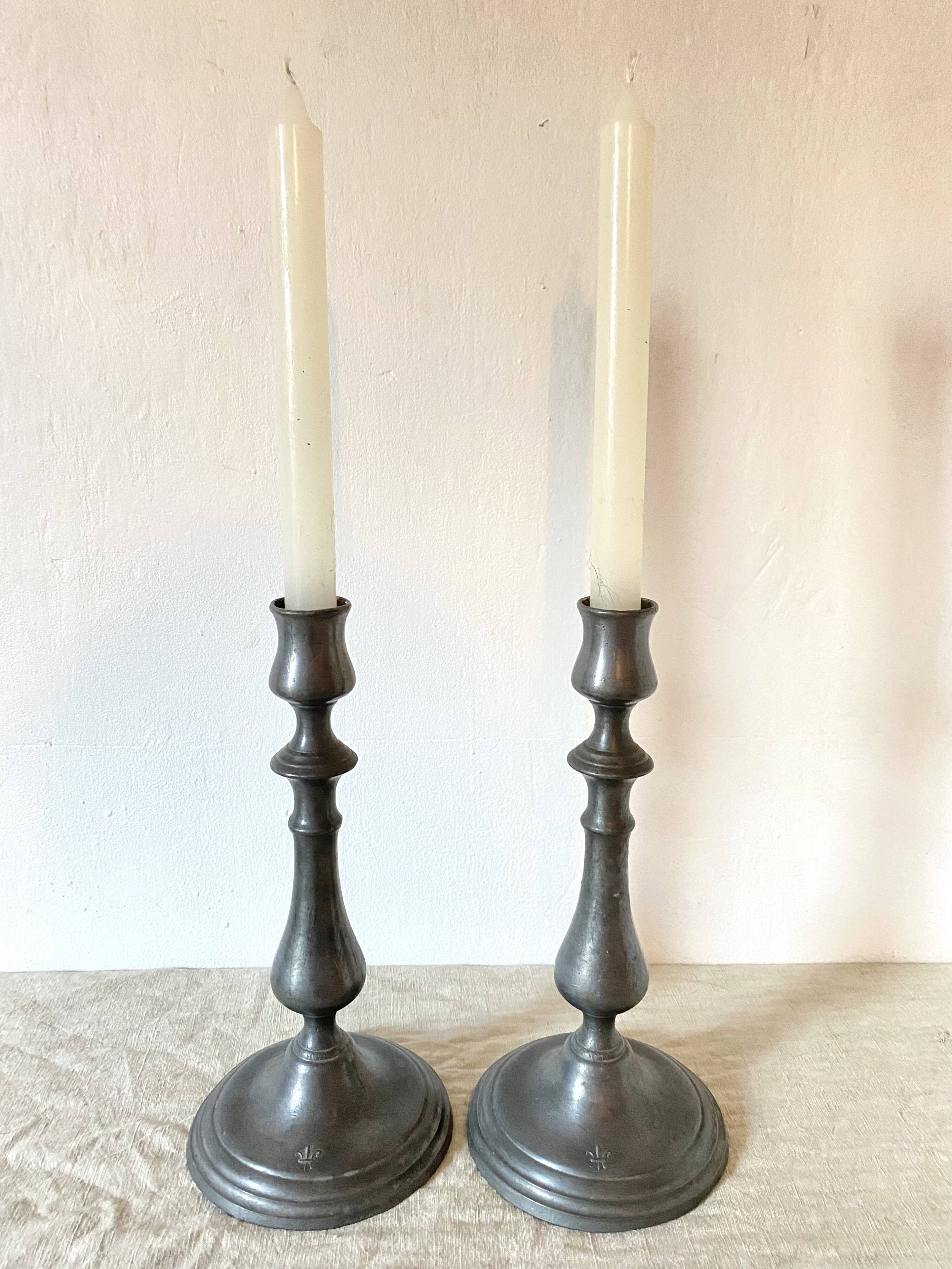 Tin candlesticks