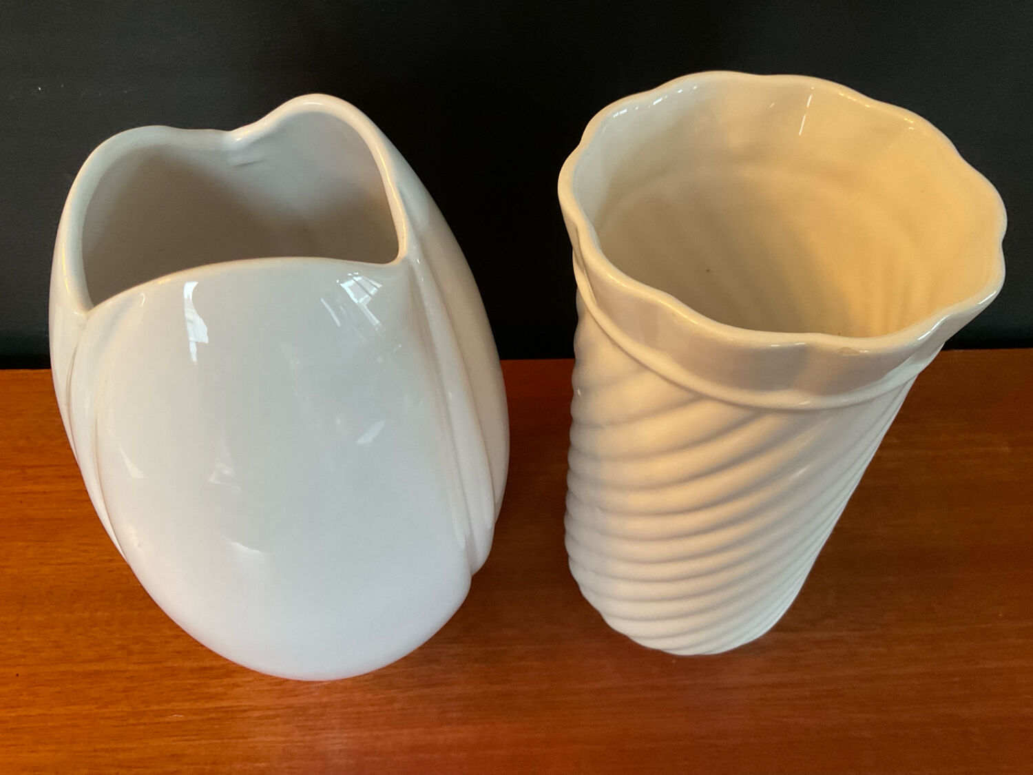 A pair of vintage ceramic vases from the 1970s.