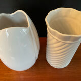 A pair of vintage ceramic vases from the 1970s.