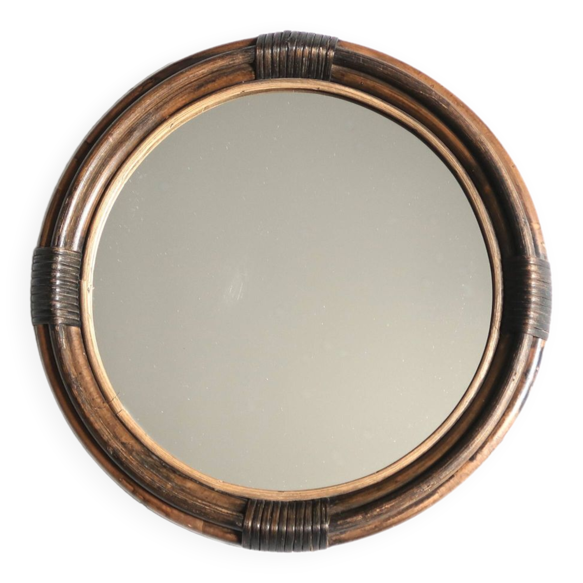 Round mirror in dark rattan, 50s
