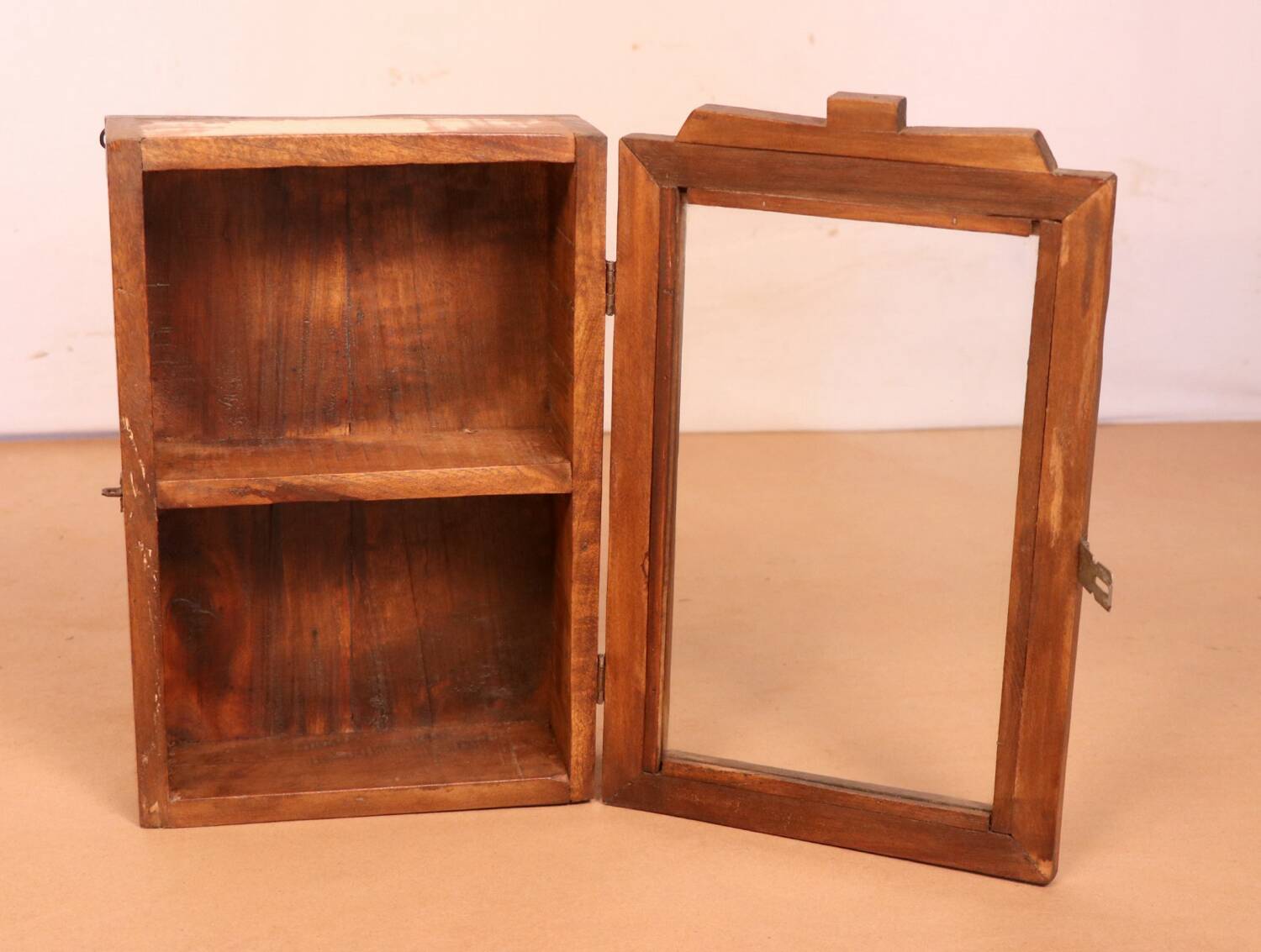Burmese teak wall display case with original polychrome patina.