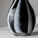 Vintage Murano glass vase from the 1980s, black and white swirl pattern, thick Italian art glass.