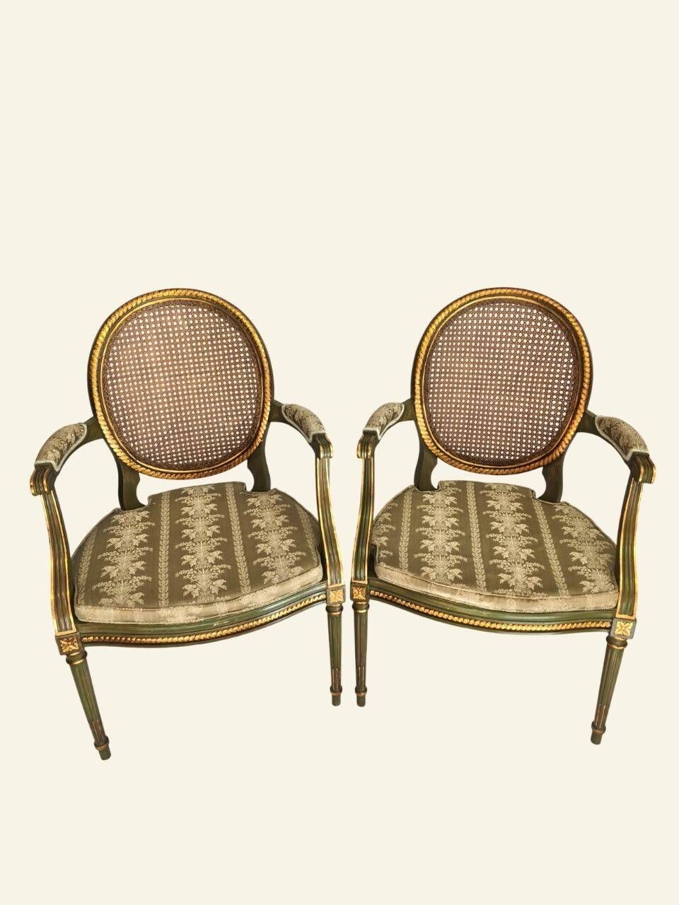 Pair of Louis XVI style armchairs, oval backrest and caning.