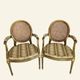 Pair of Louis XVI style armchairs, oval backrest and caning.