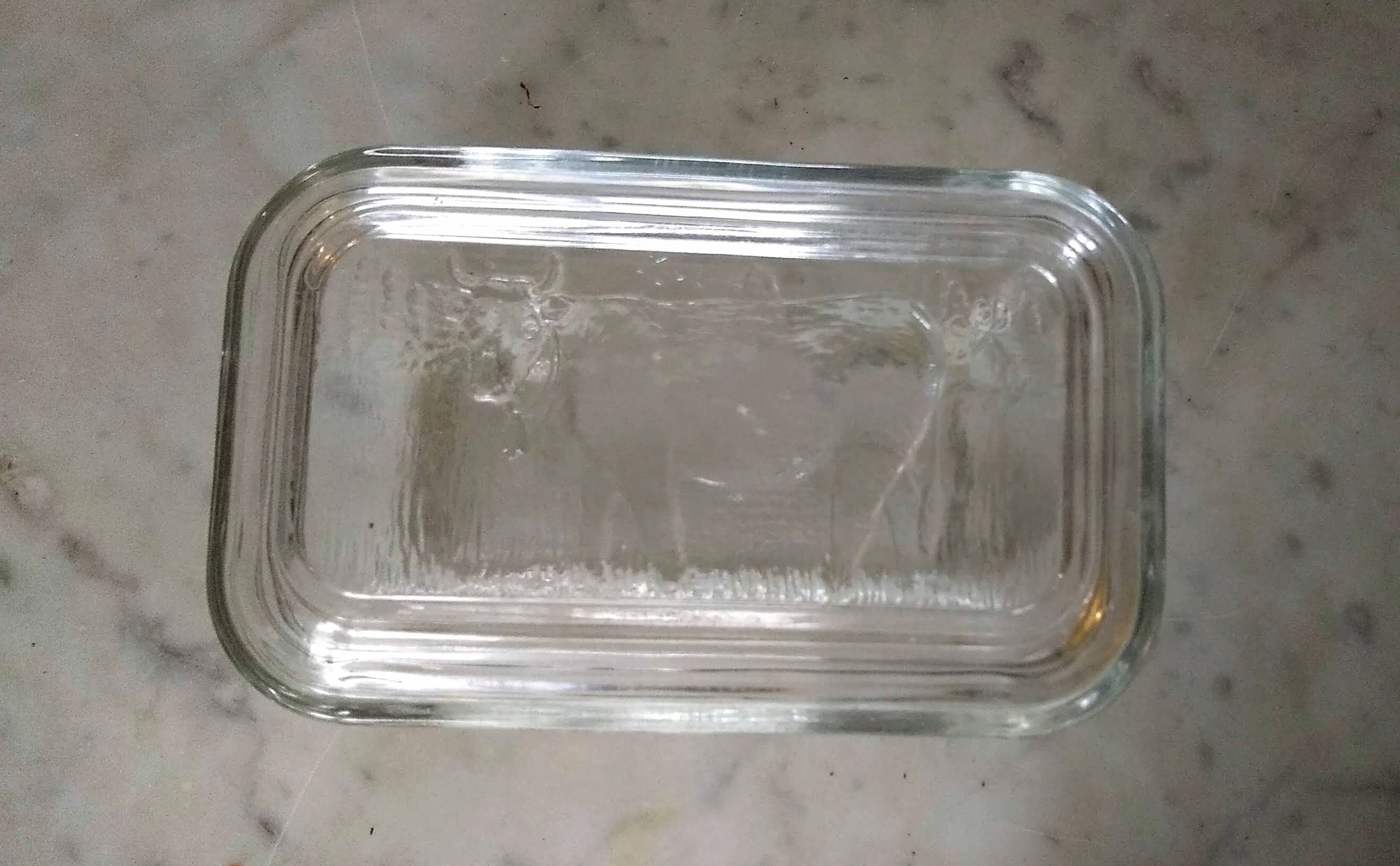 Glass butter dish with cow for decoration