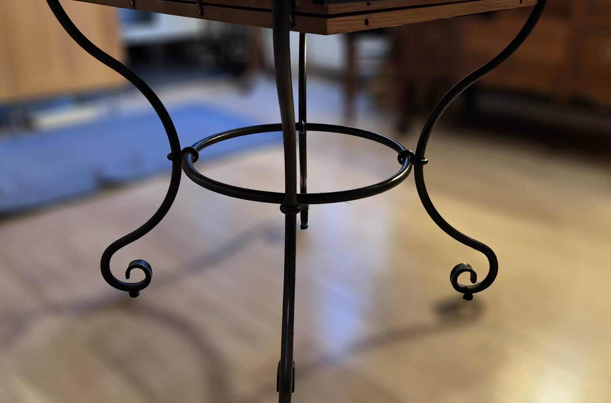 Extendable table in solid oak with wrought iron legs.