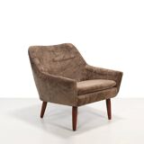 Danish design armchair in brown faux sheepskin