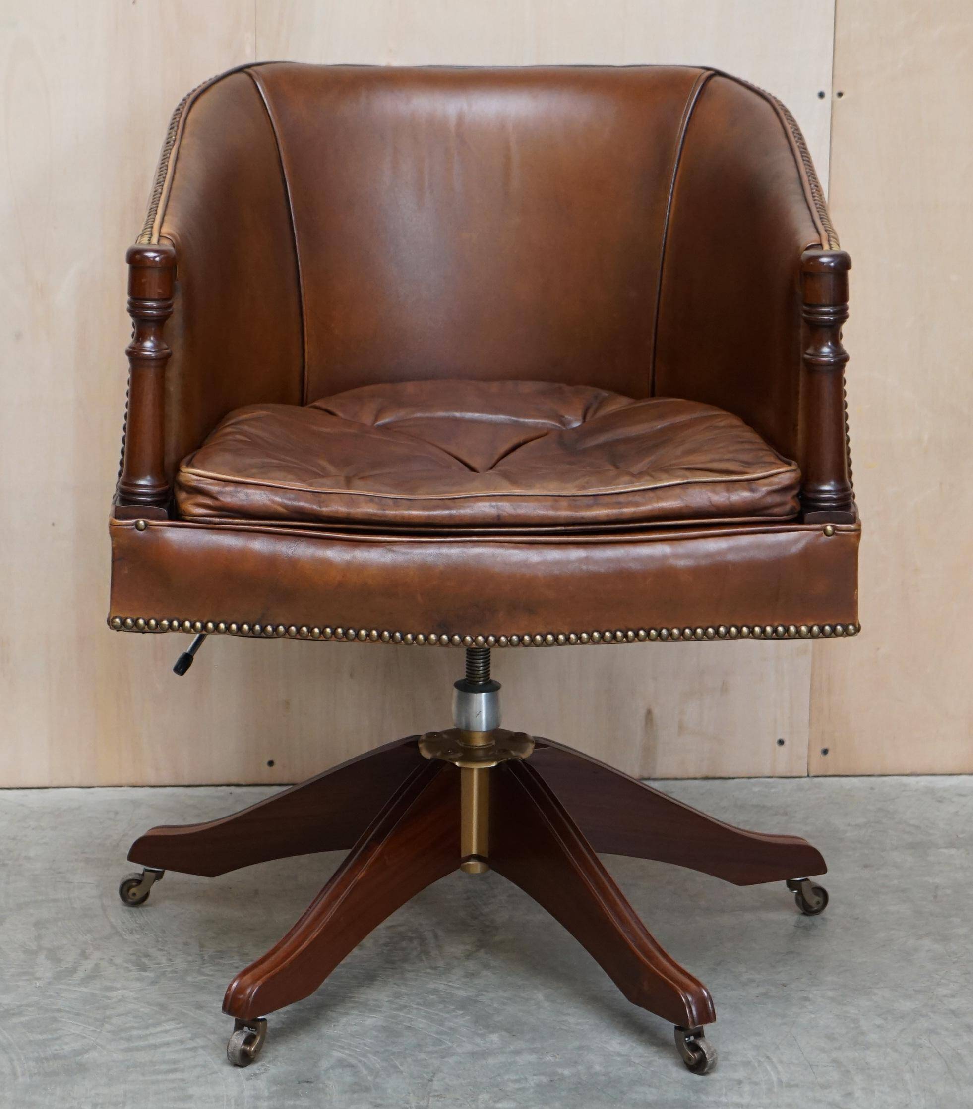Vintage Patinated Leather Chesterfield Swivel Captain's Armchair