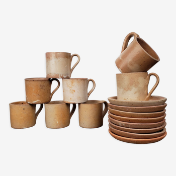 Stoneware coffee cups + saucers x8