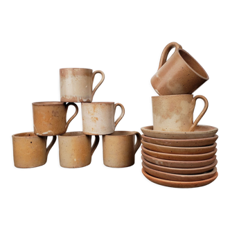 Stoneware coffee cups + saucers x8