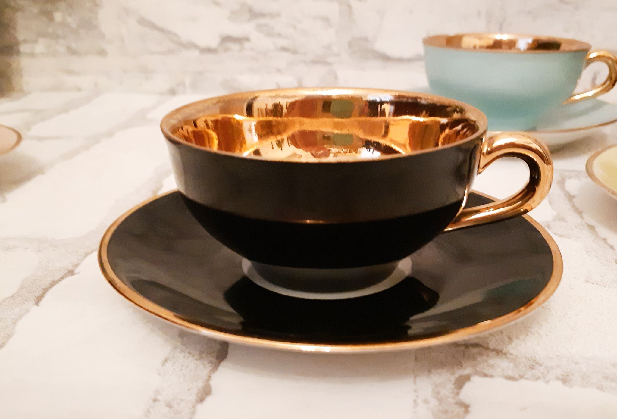 French fine porcelain coffee cups, colors and gold