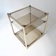 vintage coffee table design 1960s 1970s in gold metal and smoked glass