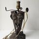 Antique lamp base in wrought iron with leaf motif in Art Deco style from the 1930s.