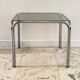 1970s coffee table glass and chrome steel