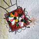 Small chair / stool in twisted wrought iron and floral ceramic.