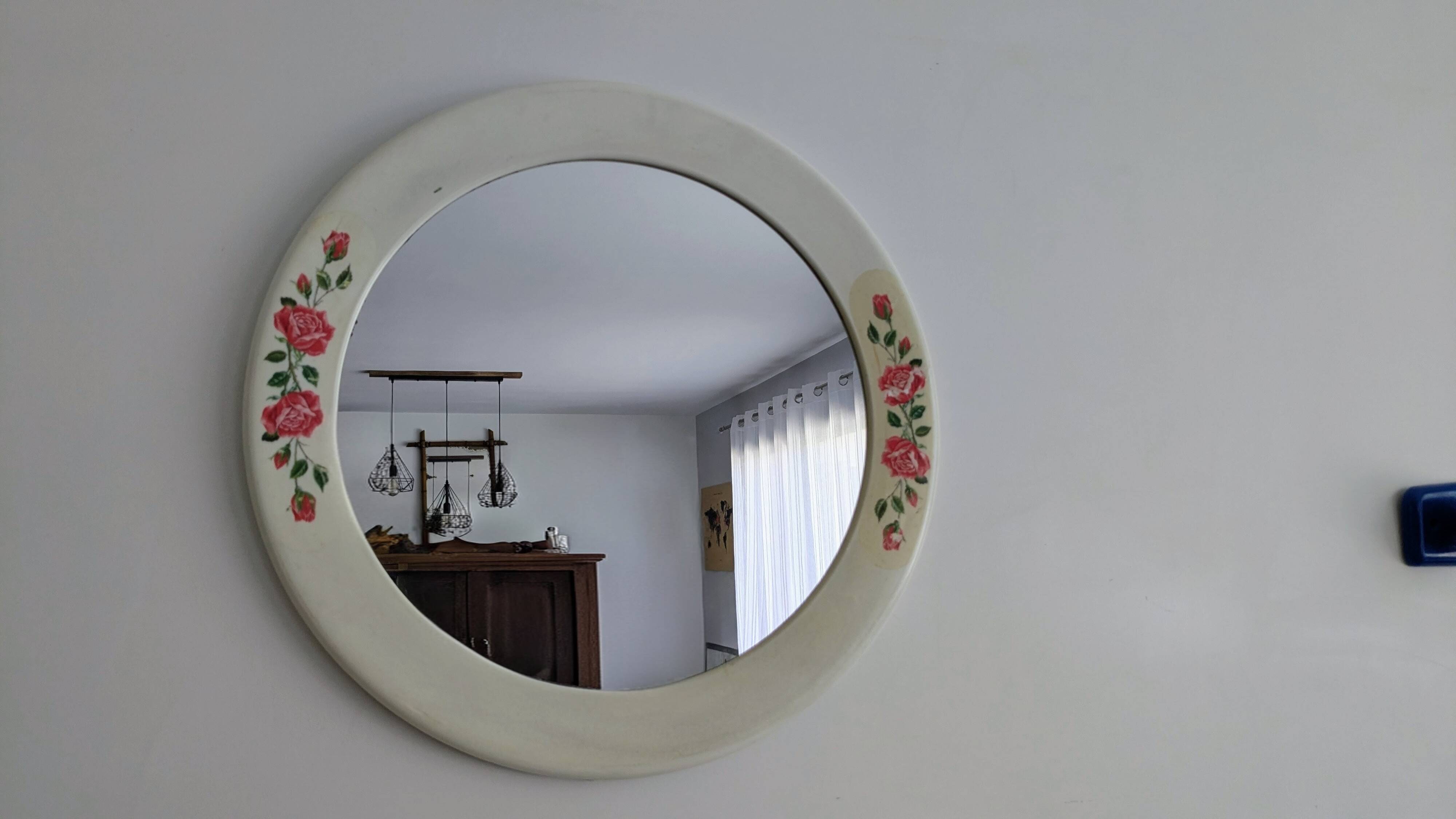 Vintage round mirror Syla model 6131 with rose decoration.