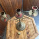 Vintage brass candelabrum engraved with three lights and a snuffer.