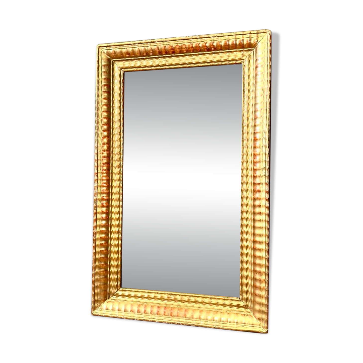 Antique gilded mirror from the Directoire period, 19th century.