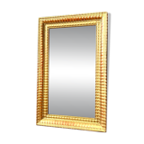 Antique gilded mirror from the Directoire period, 19th century.