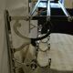 Chrome iron coat rack with hat holder