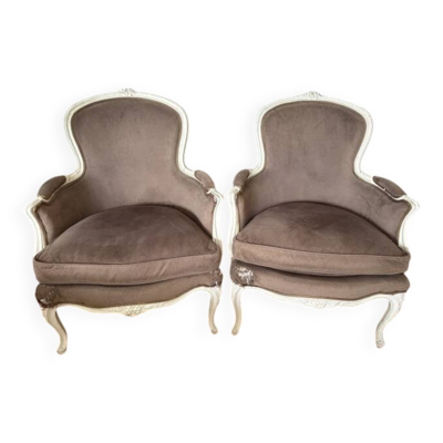 Paire de fauteuils anciens de style Louis XV en bois sculpté et velours
