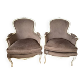 Pair of antique Louis XV style armchairs in carved wood and velvet.