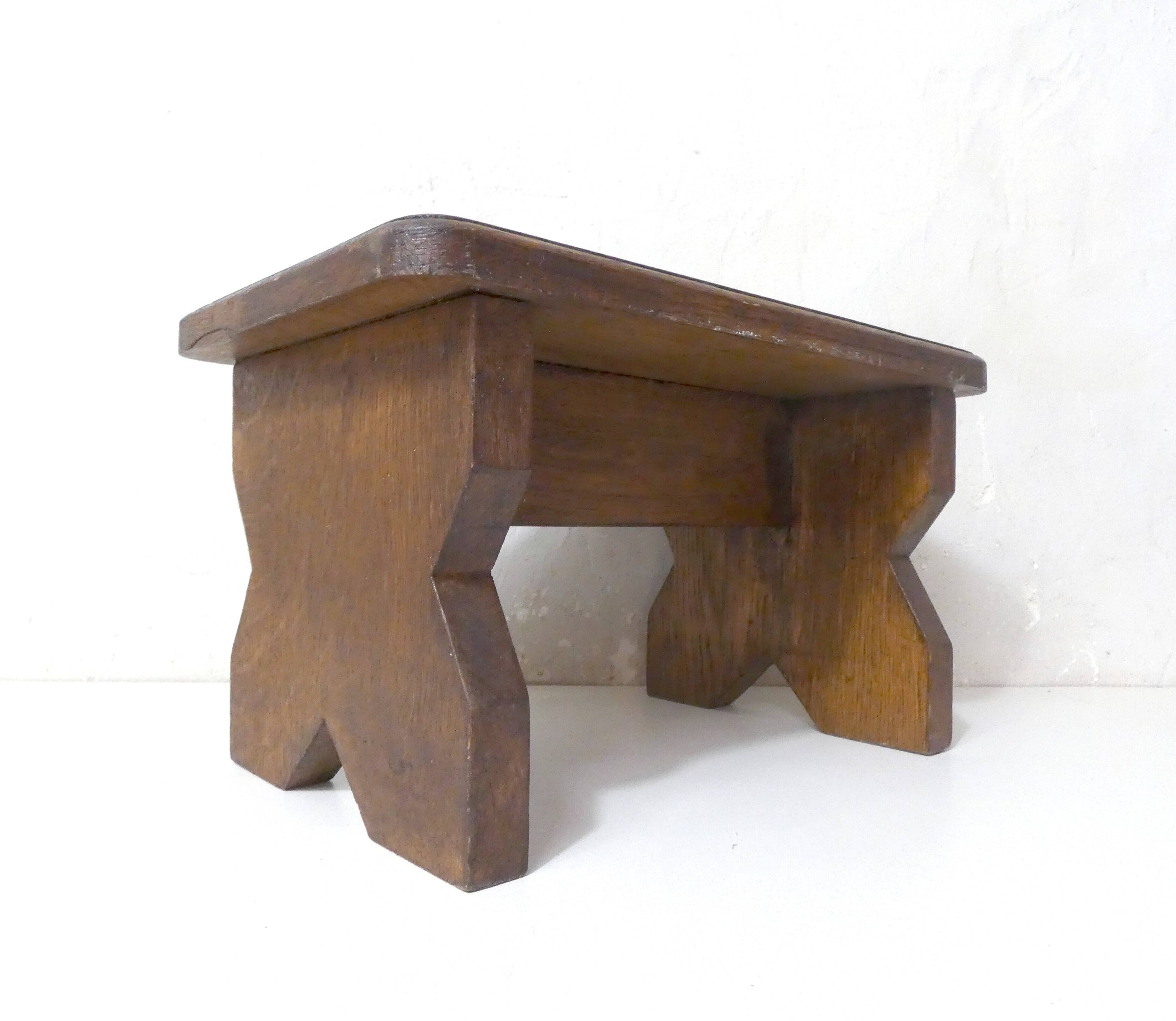 Old small bench in solid oak wood vintage step stool