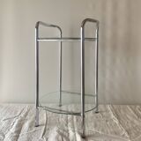 Pedestal table, vintage chrome steel saddle with 2 round windows