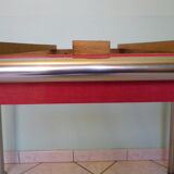 Table in red formica, 4 roc chairs, 2 extension cords, 2 drawers 60