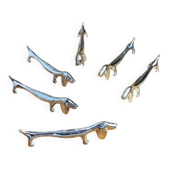 Six silver-plated dachshund napkin holders
